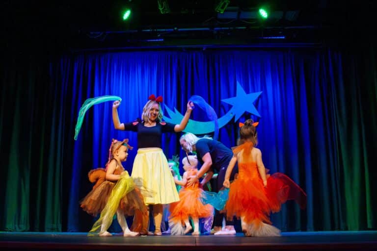 dance classes and theatre school for young children. Amy aka snow white and her seven dwarf's dancing in the Magical Tots Summer Show.